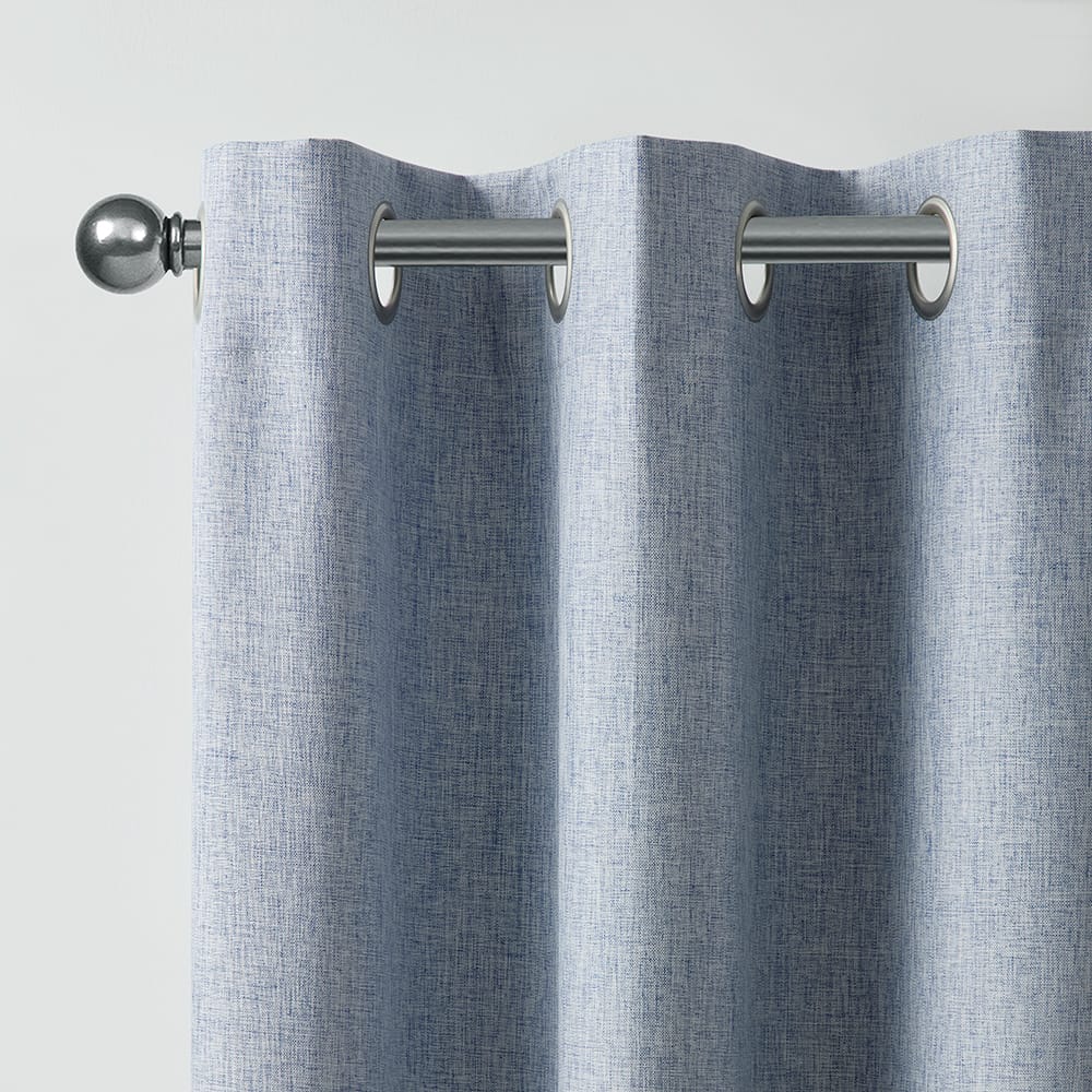 Fairfax Blue panel hanging from brushed nickel grommets on a rod